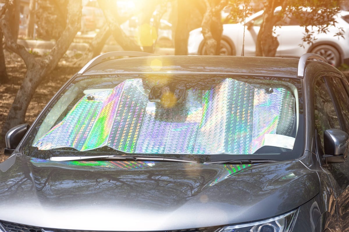 Car parked with sun shade